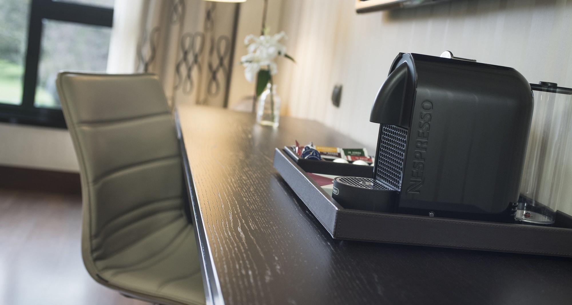 Palacio De Aviles Affiliated By Melia Kültér fotó A Nespresso machine in a hotel