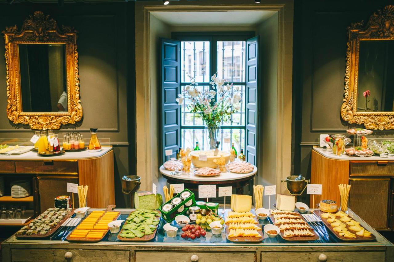 Palacio De Aviles Affiliated By Melia Kültér fotó A buffet at a hotel