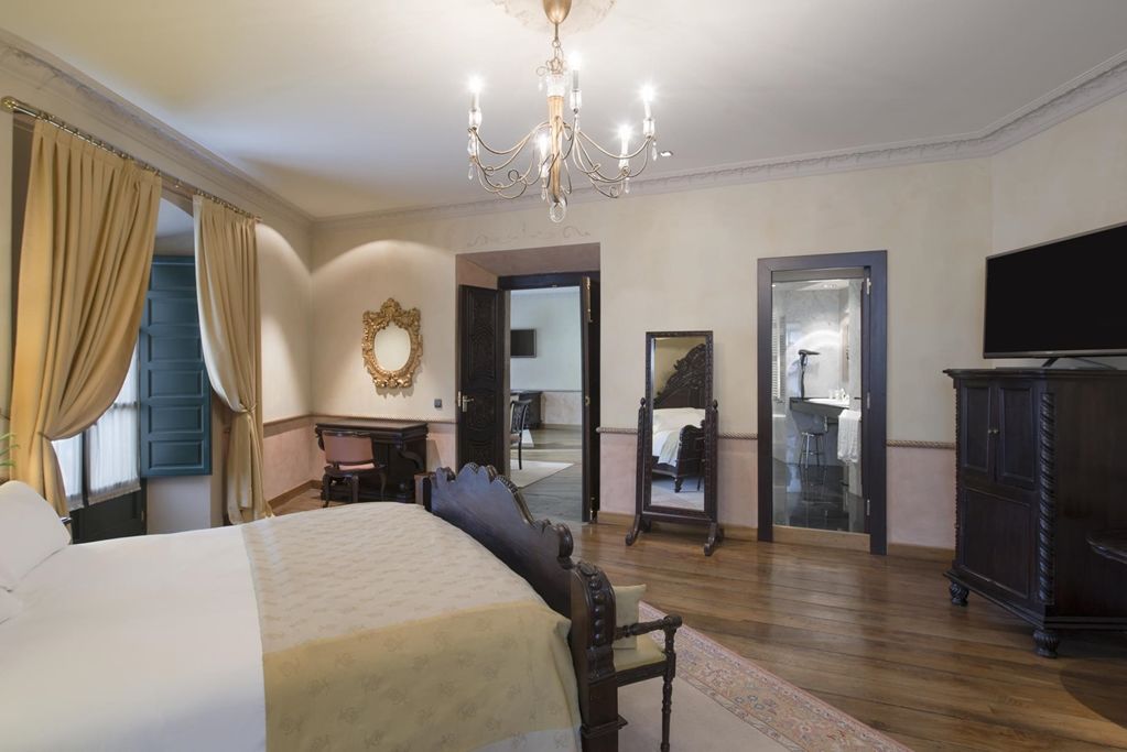 Palacio De Aviles Affiliated By Melia Kültér fotó A suite at the hotel